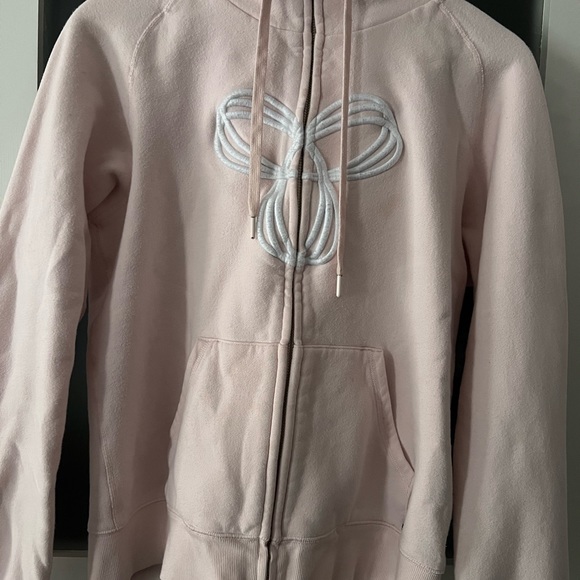 Light pink TNA aritzia zip up hoodie - Picture 1 of 3